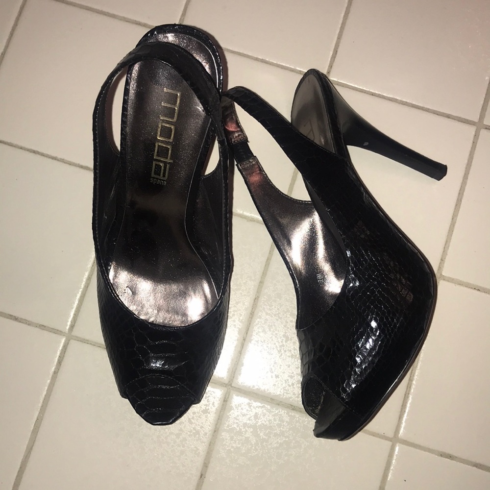 Black peep toe sling back with snakeskin pattern